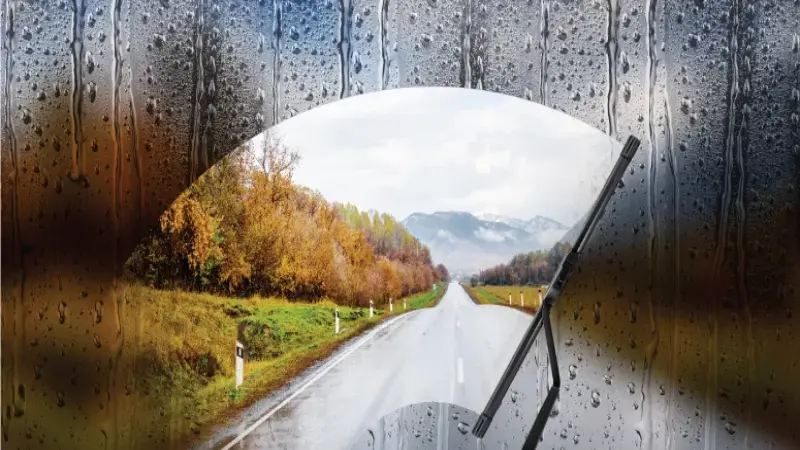 Bosch wiper blade cleaning windshield of car